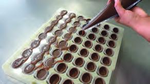 Pralinen sind bissengroße Erzeugnisse mit einem Schokoladenanteil von mindestens 5 %.