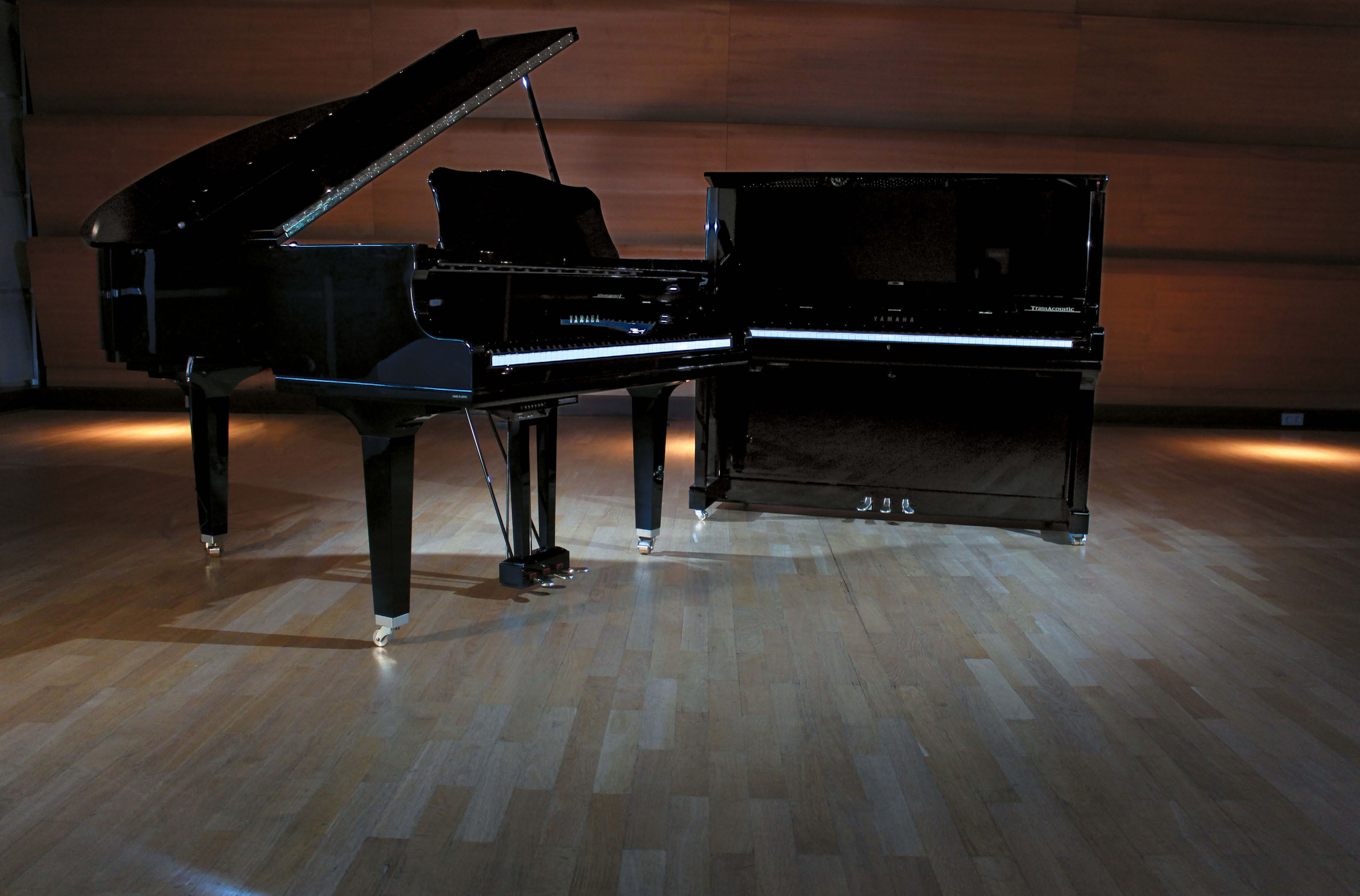 YAMAHA TRANSACOUSTIC HYBRID-PIANOS KLAVIER MIT LAUTSTÄRKE- REGLER Hybrid-Pianos also akustische Klaviere mit Stummschaltung und elektronischer Klangerzeugung sind eine bewährte und beliebte