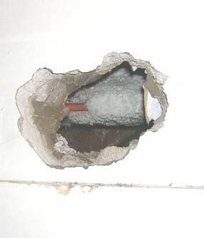 Abb. 4.3 Asbest-Isolierplatte als Trennwand.