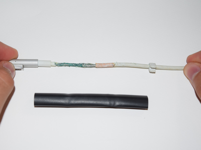 Schritt 1 Reparieren eines ausgefranste MagSafe Netzteil Draht Suchen Sie die beschädigte oder freiliegenden Fläche auf dem Adapterkabel.