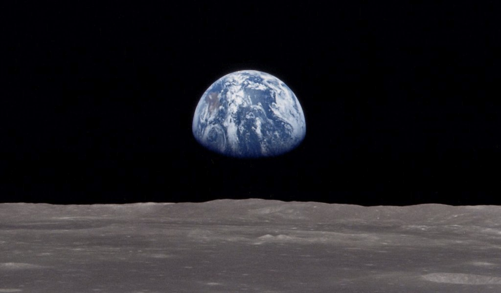 3/24 01 Motivation Eine Erde, eine Familie Im Dezember 1968 machten die Astronauten der NASA-Mondmission Apollo 8 die ersten
