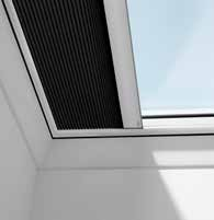 Hitzereduktion bis zu 76 % Netzstoff lässt Licht in den Raum Faltrollos Die elektrischen VELUX Faltrollos (FMG) für Flachdach-Fenster ermöglichen die Regulierung und Dämpfung des Lichts.