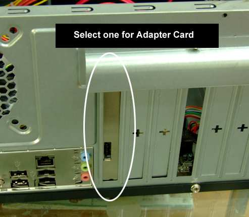 5. Carefully insert the back plate adapter card into a free