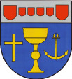 Ortsgemeinde Lauperath In Blau, unter silbernem Schildhaupt, belegt mit vier kleinen zwischen zwei größeren roten Schildchen, ein goldener Kelch, begleitet von einem goldenen Hochkreuz und einem