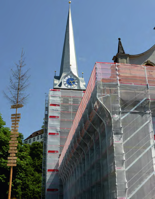 erstellen inkl. Kirchenturm bis UK Kirchenuhr, Gebäudehöhe bis 31 m. Umlaufend mit Gerüstnetz verkleiden.