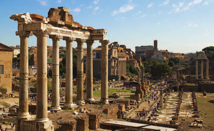 9 Das Forum Romanum mit dem Tempel des Saturn im Vordergrund und Überresten weiterer Tempel und Straßenzügen sowie das Kolosseum im Hintergrund.