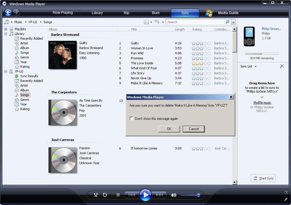 2 Zum Löschen von Musikdateien klicken Sie dann den Pfeil oben links im Windows Media Player an und wählen Sie Musik aus. Wollen Sie Bilddateien löschen, wählen Sie dementsprechend Bilder aus.
