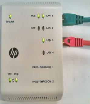 Mini-Switch Beispiel : Grünes Kabel (LAN 1) zum Telefon; rotes Kabel (LAN 3) zum PC
