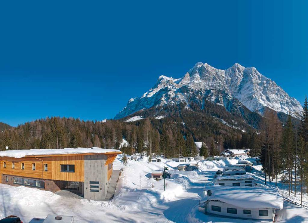 Genussvolle Camping-Urlaubstage am Fuße der Zugspitze Herzlich willkommen in unserem Vier-Sterne-Resort an der Sonnenseite der Zugspitze.