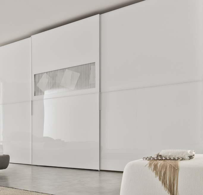 The fascination of Alberto Biasi's dynamic art: white glass wardrobe, central insert "rolling square", Lacoon bed by Désirée.