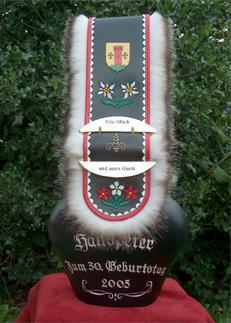 Bullertreicheln Riemen eingefasst rot / weiss Handgesticke Edelweiss mit Wappen inkl. Beschriftung auf Treichel und Schnalle Treichel Nr.