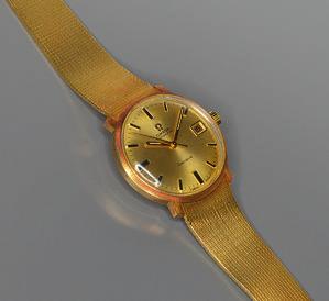 /1900. 6442. Herrenarmbanduhr, Omega. 60er-Jahre. Gehäuse vergoldet, Armband Gelbgold 18 K.