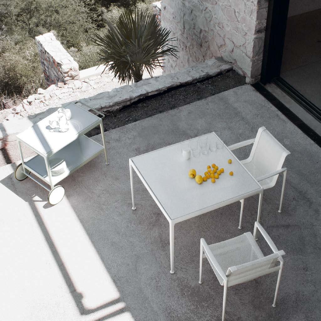 008 Knoll, Outdoor 009 Richard Schultz 1966 Dining Table with white porcelain top and white frame. 1966 Dining Chairs with white straps, white mesh and white frame.