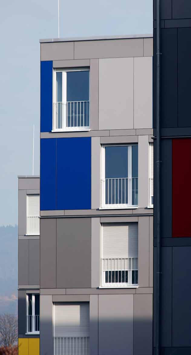 Die neuen Sudentenapartmenthäuser in Heidelberg: mit Faserzementplatten verkleidete Außenfassaden in verschiedenen Grautönen,