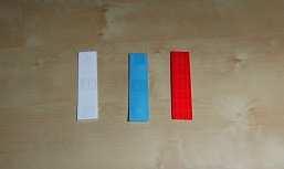 6. Fixieren Sie nun das Modul seitlich anhand der mitgelieferten Abstandsplättchen(Rot 3mm- Blau 2mm-weiß 1mm)(Foto8/b/c)