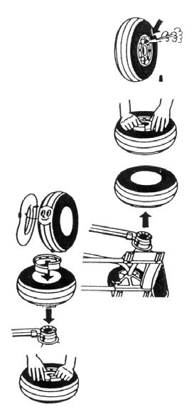 > EXPRESSO Montage/Demontage Rad > EXPRESSO Ersatzteile Demontage: Abdeckkappe (1), Seegerring (2) mittels Seegerzange lösen. Rad von Achse abziehen.