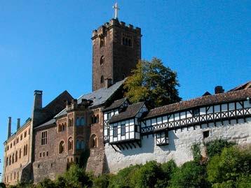 Wartburg (1999) Groß, mächtig und in jeder Mauerritze Geschichte: Hoch über der Stadt Eisenach thront die Wartburg, seit 1999 UNESCO- Weltkulturerbe.