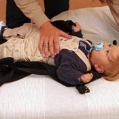 Rückentrage mit Baby (ab sicherer Kopfkontrolle) vom