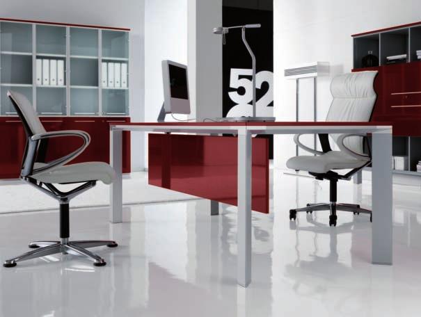 This composition includes: desk with modesty panel, typing table, bookcase with latch doors and storage units all in red bright