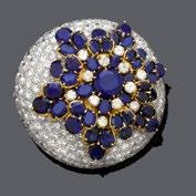 Set with 1 oval Burma star-sapphire of 23.84 ct, not heated, surrounded by marquise- and brilliant-cut diamonds totalling ca. 3.40 ct. Size ca. 53.