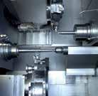 Fertigung einer Ölpumpe Production of an oil pump An der CNCgesteuerten Drehmaschine TWIN 42 werden Antriebswelle