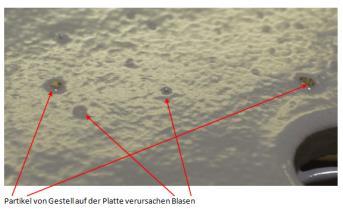 Partikeleinschluss und Blasenbildung 23 11