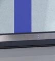 Motorverkleidung, Abschlussprofil) besteht aus Edelstahl V2A. TORBEHANG Das Tor hat einen Torbehang aus klarem PVC mit blauen vertikalen Gewebezugstreifen.