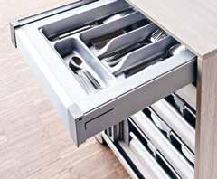 Drawers, especially designed to store cutlery, glasses and tableware offer plenty