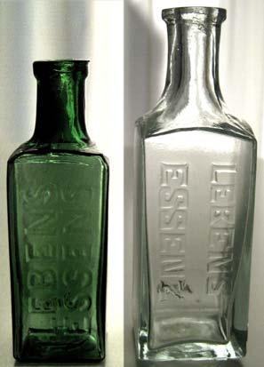2) LEBENSESSENZ Die Schrift LEBENS ESSENZ verläuft bei beiden Flaschen in zwei Reihen, bei der grünen von unten nach oben und bei der klaren von oben nach unten.