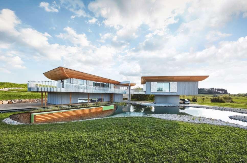 Konzepthaus Haussicht in Erkheim Gebäudeeckdaten 400 m² beheizte Fläche Heizen und Kühlen Holztafelbau mit Großelementen Biologische Naturdämmung mit