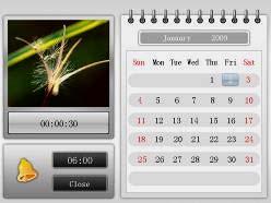 Kalenderebene: Die Kalenderebene zeigt den Kalender, die Uhrzeit, der aktuell eingestellte Alarm, sowie eine Vorschau der Bilder auf dem zuletzt gewählten Speichermedium.