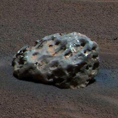Eisenmeteorit auf dem Mars NASA/JPL Mars Exploration Rover NASA/JPL Dieser unterschied sich von allen bisherigen Funden und zeigte keinerlei Ähnlichkeit zu bekannten Marsgesteinen.