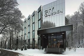 3 Erdbebengerechte mehrgeschossige Holzbauten 1 Einleitung Figur 1: 2010 eröffnetes Hotel in Zug. Architekten: EM2N Architekten AG, Zürich. Bild: City Garden, Zug.
