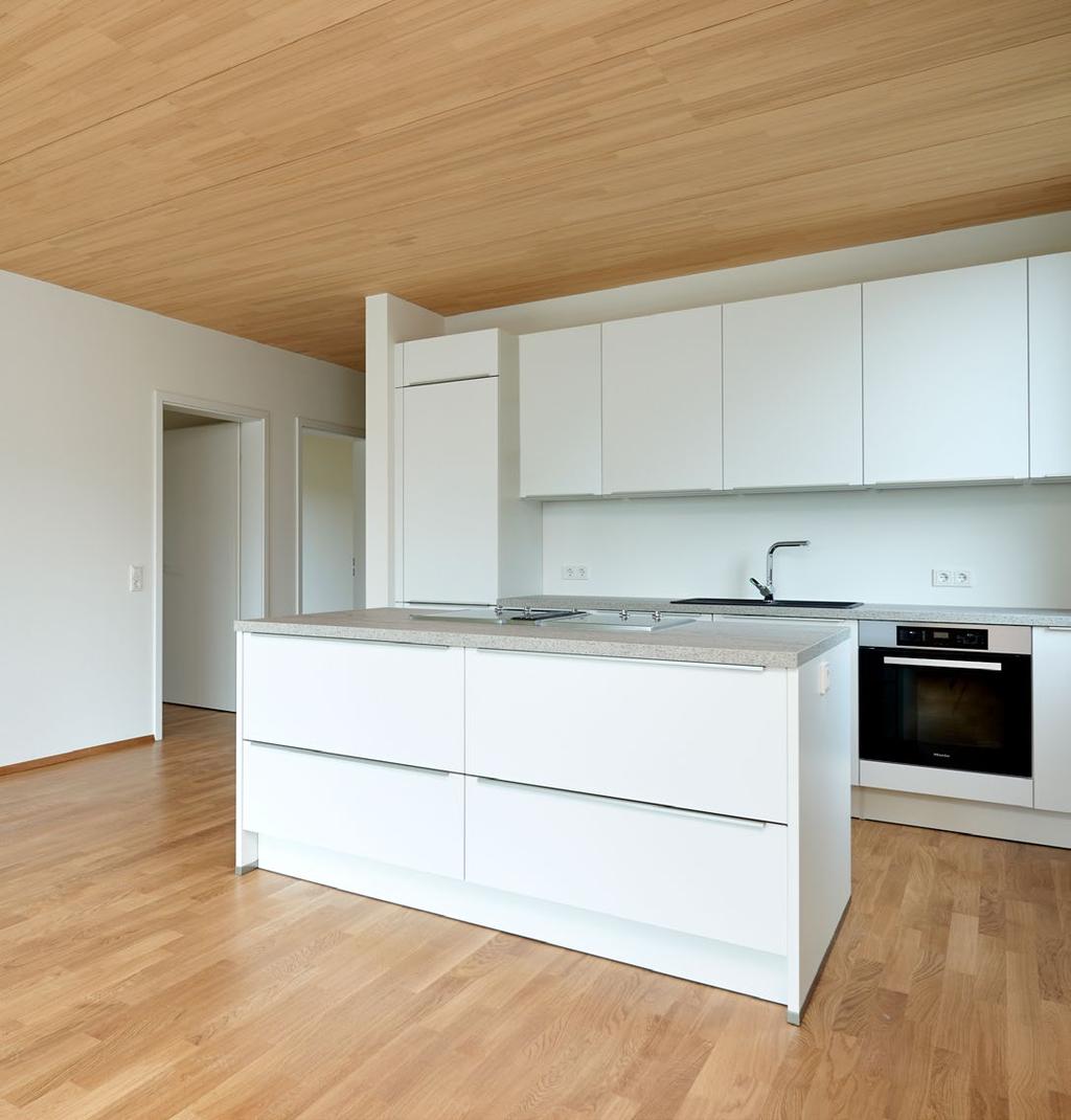 LIGNOprojekt I-04 2 Mehrfamilienhaus Lörrach Städtische Nachverdichtung schafft bezahlbaren Wohnraum Titelbild: Mit dem neuen Kopfbau für die Gebäudezeile wurde im Wohnviertel ein markanter