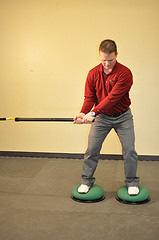 Training auf dem Dynair Golf Pro kombiniert mit dem FitnessStik Durch das