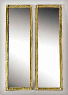 3759 Spiegel, wohl Schweiz, Ende 19. Jh. Holz geschnitzt, Stuckornamente in Form von Blattapplikationen, vergoldet. Rechteckform.
