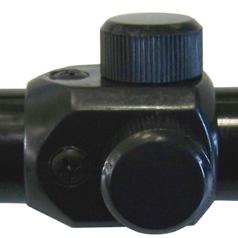 Using 2. If there are deviations between the target and the points of entry, first unscrew the two protective caps for the reticle adjustment screws (see photo on the right). 3.