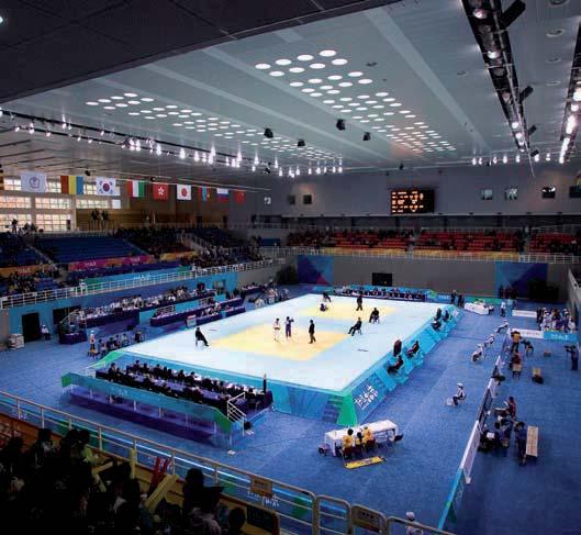 The facility s main gymnasium includes a 7,874 square foot (2,400 m 2 ) competition arena that seats over 8,000 spectators.