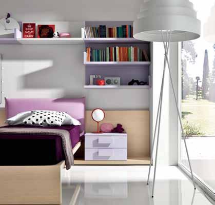 Monopoli: lilac and white wall shelves. Link System:white bookcase. Minimal: light oak desk. Strato: padded pink eco leather seat, white structure. Minimal: light oak bed, pink eco leather headboard.