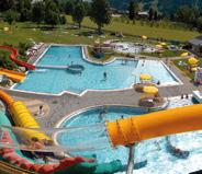 Swimming and recreational fun await you at our lake resort with a giant water slide, climbing on the Ice Berg, water trampoline, swim islands, lake café, restaurant, beach-volleyball court, sports