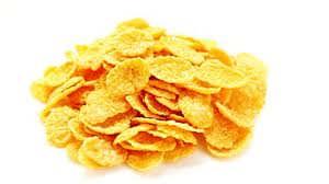 4/6 Cornflakes-Guetzli (ergibt ca. 50 Stück) 300 g Mehl 200 g Zucker 150 g Butter 30 g Pinienkerne 2 Eier 1 Eigelb Etwas abgeriebene Zitronenschale Zum Verzieren: Eine Handvoll Cornflakes 1.