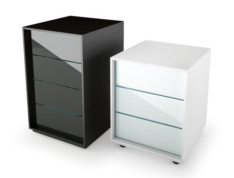 Drawer unit in 8 mm curved transparent glass. The drawers have white lacquered wood frame. The drawer unit features 2 drawers with automatic soft closure system. Chromed wheels and handles.
