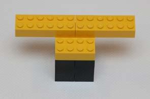 LEGO Steine, acht gelbe 1x6 LEGO Steine sowie zwei graue 2x2 LEGO
