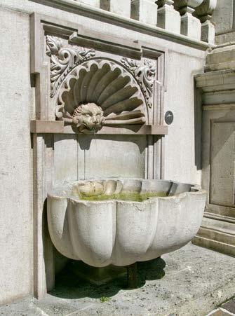 Trinkwasserbrunnen um vier sensorgesteuerte Trinkwasser-Würfel aus Granit, Edelstahl und anderen