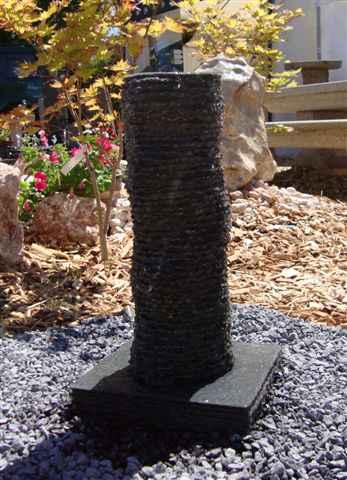 230,00 Drei Quellsteine Material: grauer Granit Maße: Höhe 100 / 85 / 65 cm