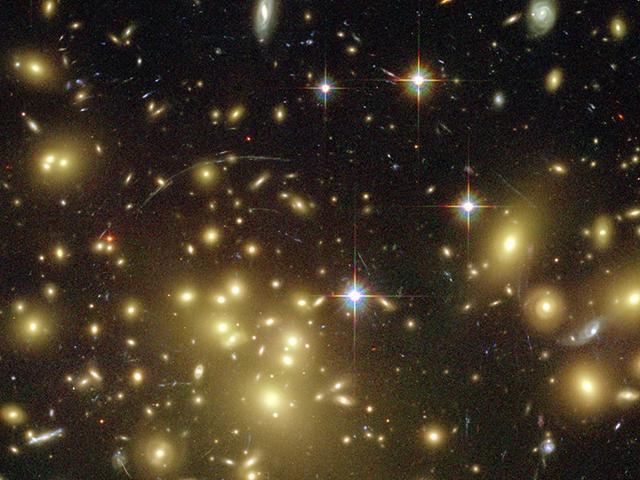 Magst du die Galaxien hier auf diesem Bild zählen? Oder die darin enthaltenen Sonnen, oder die Planeten die ihre Sonnen umkreisen? Und wieviele Stellen hätte diese Zahl dann?