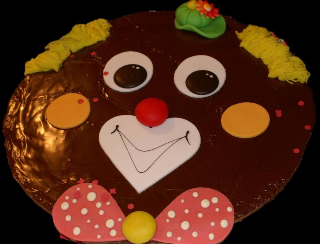 Clownkuchen Dimitri Clownkuchen Dimitri Beschreibung: Runder Schokoladen-Haselnusskuchen überzogen mit