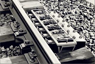 Grundlagen Sicherung Gleisfreimeldung Zugmeldung Zentralisierung Betriebsführung Gleisfreimeldung Sechsteiliger Laufkranztaster (1930) Quelle: Siemens AG, Rail Automation: Chronik der Leitund