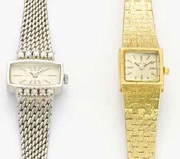 Uhren Uhren 229 KONVOLUT: ZWEI BROSCHEN, ZWEI UHREN, EINE KETTE. Deutschland/Schweiz, Um 1900-1990. 585/- und 750/- Gelbgold, 950/- Platin, gestempelt, Gesamtgewicht: 76,5g. Kette L.ca.