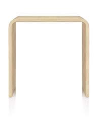 Passende Tische, aus Buchenformholz mit Eichefurnier oder weiß satiniertem Acrylglas, geformt aus einem Materialstück, vervollständigen das Programm.
